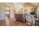 Spacious living room with hardwood floors, vaulted ceilings, a fireplace, and an open layout at 320 Red Fox Dr, Canton, GA 30114