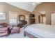 The bright main bedroom features vaulted ceilings, soft carpet, and natural light at 320 Red Fox Dr, Canton, GA 30114