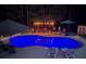 Backyard swimming pool with a lighted gazebo and plenty of space for outdoor entertaining at 320 Red Fox Dr, Canton, GA 30114