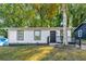 Charming front exterior featuring a cozy porch and well-maintained lawn at 338 Lincoln Sw St, Atlanta, GA 30315