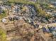 Residential neighborhood with a home situated on a tree-lined street near a golf course at 3690 Millwater Xing, Dacula, GA 30019