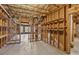 Unfinished basement with wooden frame and shelves offers customization and storage options at 3690 Millwater Xing, Dacula, GA 30019