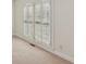 Bright bedroom with white plantation shutters and neutral carpet providing lots of natural light at 3690 Millwater Xing, Dacula, GA 30019