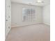 The bedroom is large, bright, and neutrally decorated at 3690 Millwater Xing, Dacula, GA 30019