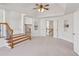 Light filled bonus room offers flexible living space with plush carpeting at 3690 Millwater Xing, Dacula, GA 30019
