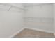 Walk-in closet features metal shelving at 3690 Millwater Xing, Dacula, GA 30019