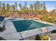 Outdoor community pool features slides and splash pad for the Gathering in this neighborhood at 3690 Millwater Xing, Dacula, GA 30019