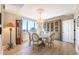 Elegant dining room featuring a chandelier, marble table, and expansive city view at 75 14Th Ne St # 3160, Atlanta, GA 30309