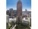 Striking view of an urban high rise, with a unique pyramidal design and arched entrance at 75 14Th Ne St # 3160, Atlanta, GA 30309