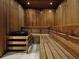 This wood-paneled sauna features built-in benches and a traditional heater for a relaxing spa experience at home at 75 14Th Ne St # 3160, Atlanta, GA 30309