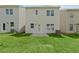 View of a well-maintained backyard with newly constructed homes at 150 Chandler Trace, Covington, GA 30016