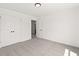 Bright, carpeted bedroom with natural light and closet doors at 150 Chandler Trace, Covington, GA 30016