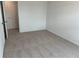 Neutral bedroom showcasing plush carpeting and a doorway at , Conyers, GA 30094