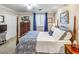 Comfortable bedroom bathed in natural light featuring soft colors, plush bedding, and ample closet space at 300 Johnson Ferry Ne Rd # A712, Atlanta, GA 30328