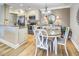 Cozy dining area featuring an elegant chandelier, neutral walls and plenty of natural light at 300 Johnson Ferry Ne Rd # A712, Atlanta, GA 30328