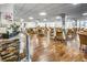 Spacious dining room with hardwood floors, tables with seating, and bright natural light at 300 Johnson Ferry Ne Rd # A712, Atlanta, GA 30328