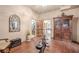 Spacious exercise room with hardwood floors, a walk-in closet, custom furniture, and workout equipment at 4880 Cecilia Sq, Cumming, GA 30040