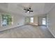 Large main bedroom with ceiling fan and windows allowing for lots of natural light at 3075 Elizabeth Ln, Snellville, GA 30078