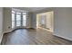 Bright living room featuring vinyl plank floors and bay window at 3075 Elizabeth Ln, Snellville, GA 30078
