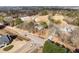 An aerial view of a residential neighborhood with tree-lined streets and various style homes, offering a peaceful setting at 4951 Center Hill Church Rd, Loganville, GA 30052