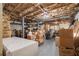 Unfinished basement area perfect for storage, featuring exposed ceilings and concrete flooring at 4951 Center Hill Church Rd, Loganville, GA 30052