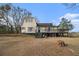 Charming two-story home with traditional siding, shuttered windows, and a welcoming deck at 4951 Center Hill Church Rd, Loganville, GA 30052