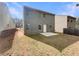 A home's backyard shows the green lawn, concrete patio and the rear entry door at 5532 Union Pointe Pl, Union City, GA 30291