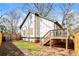 The backyard features new wood fencing, a small deck, and a patch of grass at 1114 Oak Knoll Se Ter, Atlanta, GA 30315