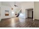 Bright living room with hardwood floors, high ceilings, and a modern ceiling fan at 1114 Oak Knoll Se Ter, Atlanta, GA 30315