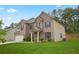 Beautiful two-story home featuring brick and siding, a manicured lawn, and attached garage at 164 Charolais Dr, Mcdonough, GA 30252