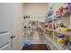 Spacious pantry with ample shelving, perfect for storing groceries and household supplies in an organized manner at 164 Charolais Dr, Mcdonough, GA 30252