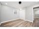 Neutral bedroom with a closet and luxury vinyl flooring and natural light at 2198 Star Mist Sw Dr, Atlanta, GA 30311