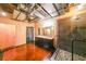 Bathroom featuring a stone shower, a vanity, and an open layout with industrial-style fixtures and finishes at 319 Atlanta Se St # 110, Marietta, GA 30060