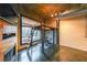 Unique living room featuring a custom loft with ladder, concrete floors, and industrial-style exposed ductwork at 319 Atlanta Se St # 110, Marietta, GA 30060