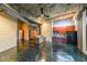 Living space with modern kitchen and concrete floor at 319 Atlanta Se St # 110, Marietta, GA 30060