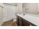 Bathroom featuring vinyl flooring, a vanity with a sink, and a shower/tub combo at 3257 Alhambra Cir, Hampton, GA 30228