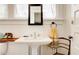 Bathroom featuring a pedestal sink and decorative mirror at 565 Candler St, Atlanta, GA 30307