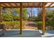 View from the covered porch shows the backyard at 565 Candler St, Atlanta, GA 30307