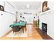 Elegant dining room with hardwood floors and brick fireplace at 565 Candler St, Atlanta, GA 30307