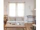 Bright, cozy living room with a rustic coffee table at 565 Candler St, Atlanta, GA 30307