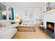 Inviting living room featuring a fireplace and hardwood floors at 565 Candler St, Atlanta, GA 30307