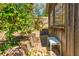 Exterior of rustic outbuilding offers a private retreat with a brick-lined patio at 565 Candler St, Atlanta, GA 30307