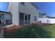 Exterior view of home, backyard, with white fencing and a small screened in porch at 5990 Mountain Top Pl, Cumming, GA 30041