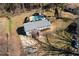 Aerial view of home with backyard pool and large lot at 2007 Manassas Dr, Woodstock, GA 30189