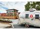 Reformation Brewery with a spacious outdoor seating area and vintage Airstream trailer, perfect for socializing at 2007 Manassas Dr, Woodstock, GA 30189