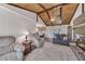 Bright and airy living room with a fireplace, ceiling fan, and an open layout perfect for entertaining at 2007 Manassas Dr, Woodstock, GA 30189