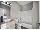 Well-lit bathroom with modern fixtures, a vanity, and a shower-tub combination at 2820 Maxwell Pl, Lithia Springs, GA 30122