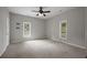 Inviting bedroom with two windows, ceiling fan, and a spacious layout at 2820 Maxwell Pl, Lithia Springs, GA 30122