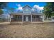 Inviting home with a classic covered porch, perfect for enjoying the outdoor space at 2820 Maxwell Pl, Lithia Springs, GA 30122