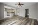 Open floor plan connects the kitchen to the living room with wood floors at 2820 Maxwell Pl, Lithia Springs, GA 30122